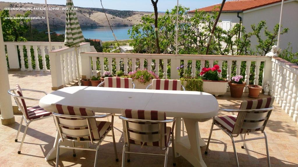 Lopar Apartment | Apartment in Lopar with sea view, balcony, air conditioning, WiFi (4911-2)