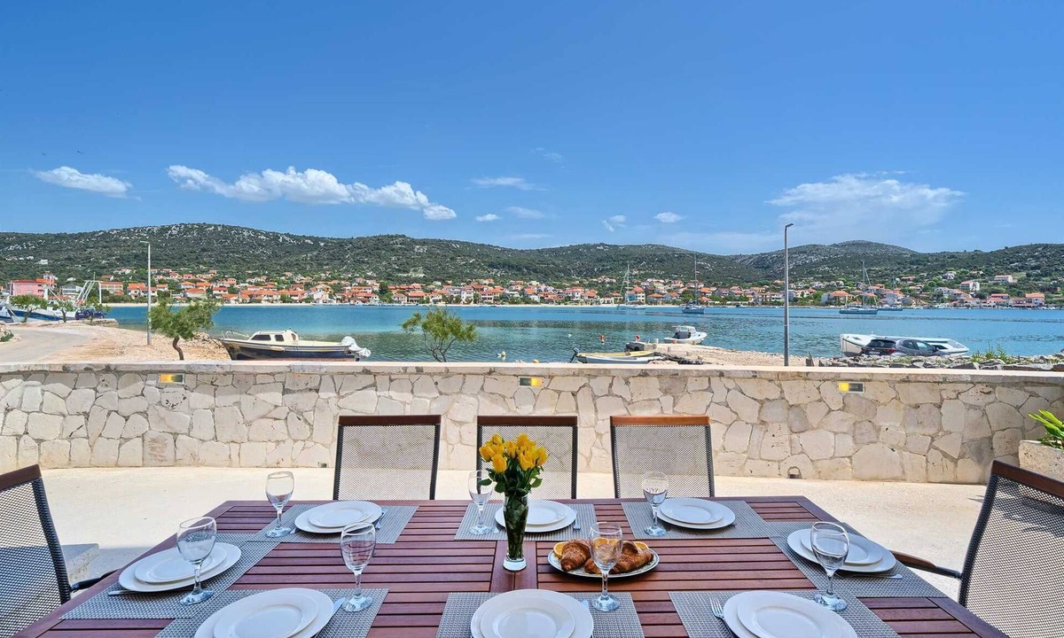 Vinisce Villa | Beach House Joy - charming waterfront villa with a heated pool for 8 guests by MyWaycation