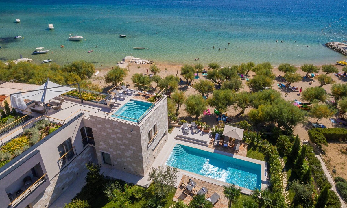 Omis Villa | Beachfront Villa Flores: Luxury with Indoor/Outdoor Pools, Rooftop Jacuzzi