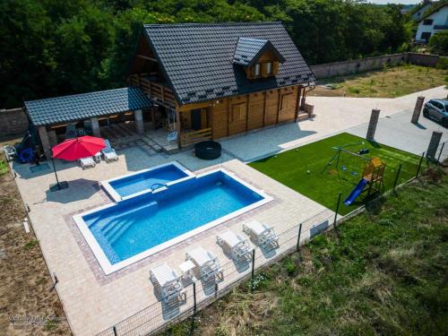Vukovar House | Danube View Villa with Pool, Jacuzzi & Family Yard by Destination GREEN Croatia