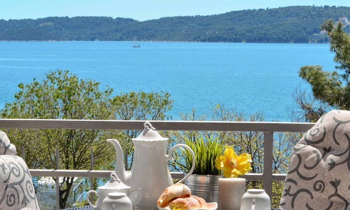 Seget Donji Apartment | Fantastic beachfront apartment with private balcony on the Adriatic.Top location