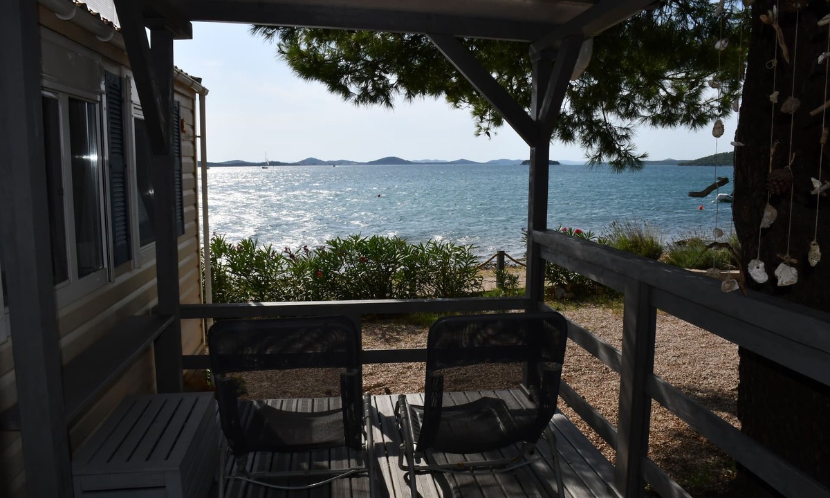 Pirovac House | Holiday house/mobile home in the 1. Line seafront, 34 m² + 24 m² terrace