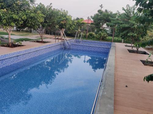 Bhimunipatnam Villa | Sivarama garden resort 1 AC 1 bed room swimming pool,BOX CRICKET , Born fair,BBQ,Kichan ect , near bheemili beach road vishhkhapatnam