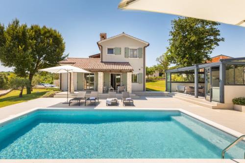 Butkovici Villa | Villa Philia by Villsy - with heated salt water pool