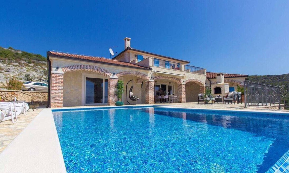 Oglavci Villa | Villa Terra is luxury home - a blend of rustic exterior and modern interior.