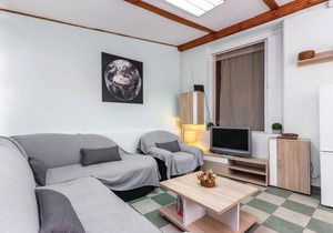 This attractive apartment is located in Kostrena, right by the sea and also not far from Crikvenica.