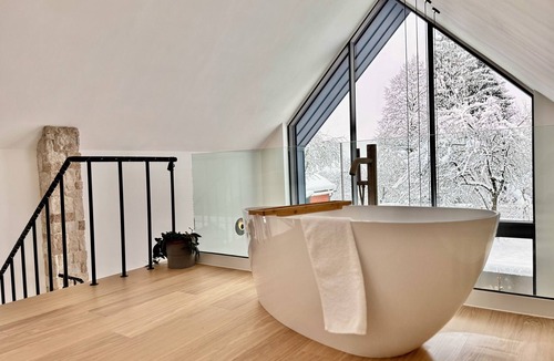Presika House | A-frame forest retreat with bathtub and nature view