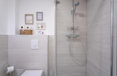 Bosana Apartment | A White Cliffside Studio