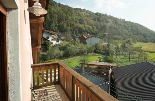 Kamno Apartment | Apartment Krn 90 m2 in holiday house Maharac (part of socaholidays) with 3 bedrooms, top floor, airconditioning, sleep till 6, own balcony and terrace next to the shared garden and BBQ.