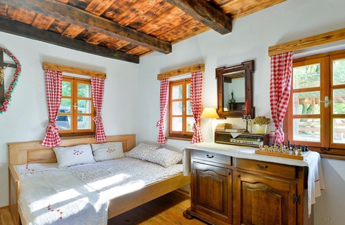 Veliki Lovrecan House | At the foot of the hill and in the shade of the forest, lies this rural cottage, furnished in old-fa