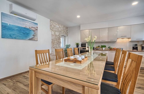 Vinisce Villa | Beach House Joy - charming waterfront villa with a heated pool for 8 guests by MyWaycation