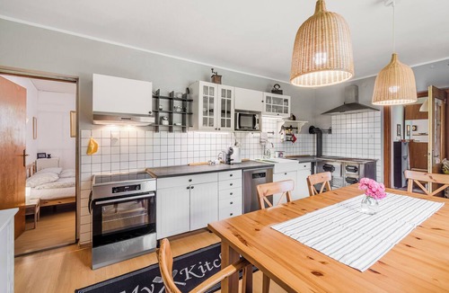 Cezsoca House | Charming house in Čezsoča near Bovec with mountain views. Sleeps up to 7 guests in 3 bedrooms and sofa bed. First-floor apartment close to the Soča River, shops, hiking trails, cycling routes and outdoor adventures.