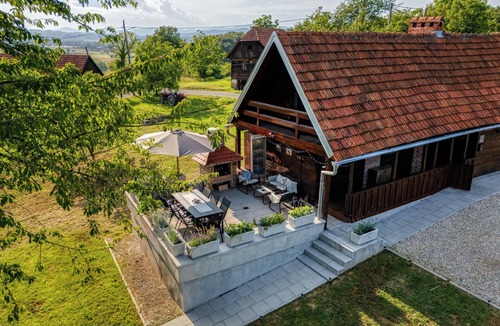 Ozalj House | Charming wooden riverside home for peaceful family stay and nature escape.