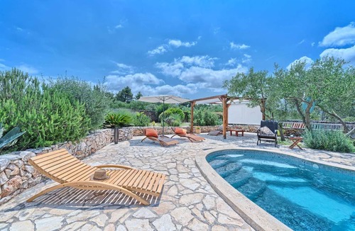 Cove Basina (Jelsa) Villa | Cottage Lost Paradise - 3 stone houses surrounded by 3000 m2 garden with heated pool by MyWaycation