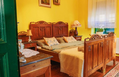 Bilje House | Cozy 3-bedroom farmhouse surrounded by a vibrant garden full of plants.