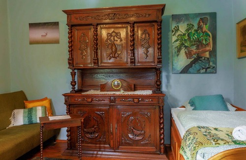 Bilje House | Cozy 3-bedroom farmhouse surrounded by a vibrant garden full of plants.