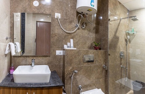 DLF Phase 3 Hotel | Double Delux Room @ Sterling Room with Balcony Near DLF Cyber City