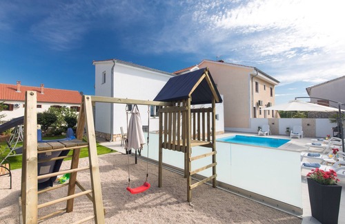 Krk Apartment | Family-friendly apartment LiJan °3 with heated salt water pool and sea view