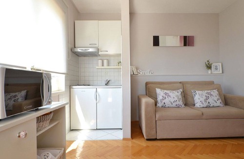 Seget Donji Apartment | Fantastic beachfront apartment with private balcony on the Adriatic.Top location