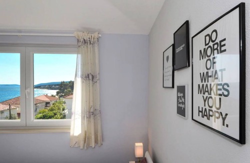 Seget Donji Apartment | Fantastic beachfront apartment with private balcony on the Adriatic.Top location