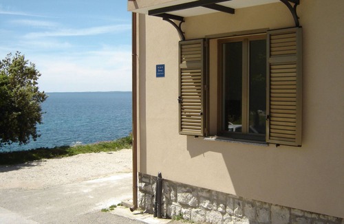 Koromacno Apartment | Gemütliches Appartment direkt am Strand by Interhome