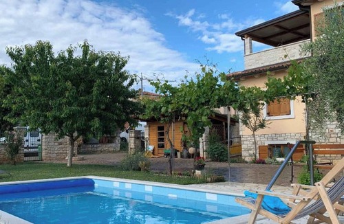 Fiorini Apartment | Holiday apartment with swimming pool and terrace in a residential complex near the sea