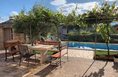 Fiorini Apartment | Holiday apartment with swimming pool and terrace in a residential complex near the sea