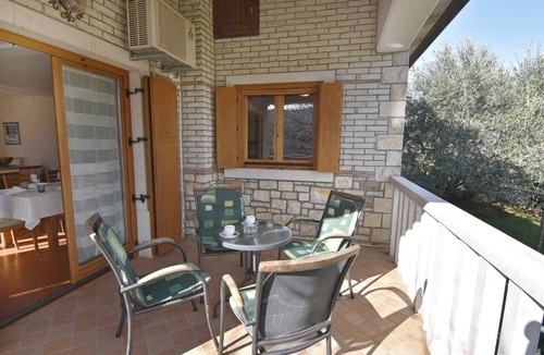 Fiorini Apartment | Holiday apartment with three bedrooms, swimming pool and garden in a quiet village
