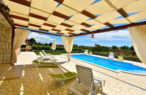 Tinj House | Holiday Home Frane by Interhome