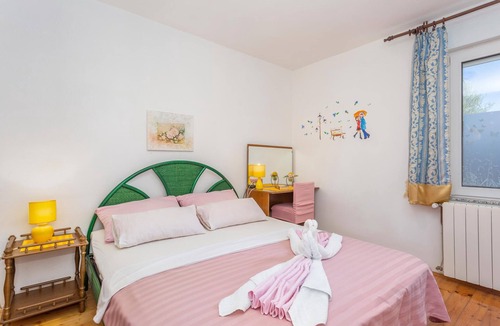 Polje Apartment | In this beautiful house on the 1st floor is tastefully furnished apartment CKK724 with minimum ceili