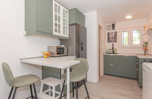 Jadrija Apartment | Look forward to this tasteful and modern vacation apartment near the beach.