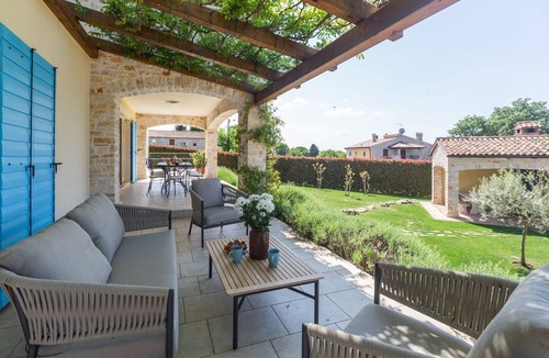 Heraki House | Mediterranean stone villa with heated private pool, aromatic Mediterranean plants