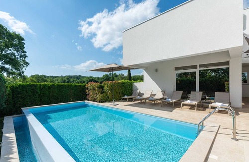 Zminj Villa | Modern Villa with Heated Indoor and Outdoor Pool for up to 8 Guests