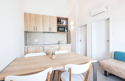 Seget Donji Apartment | Nice apartment for 5 people with A/C, pool, WIFI, TV, terrace and pets allowed