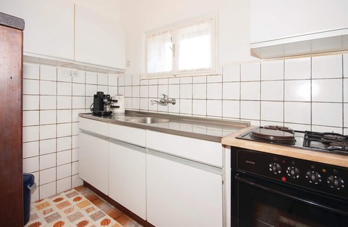 Dvornica Apartment | On a small hill is this simply furnished apartment on the second floor.