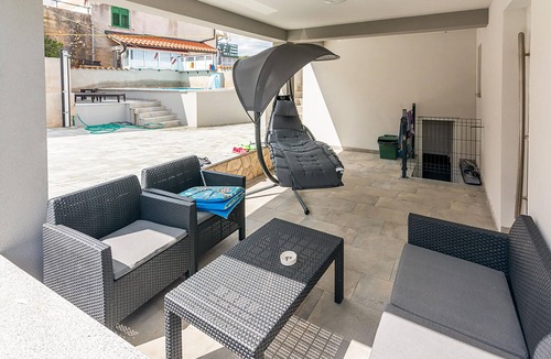 Polje Apartment | On the island of Krk welcomes you this beautiful apartment with shared pool.