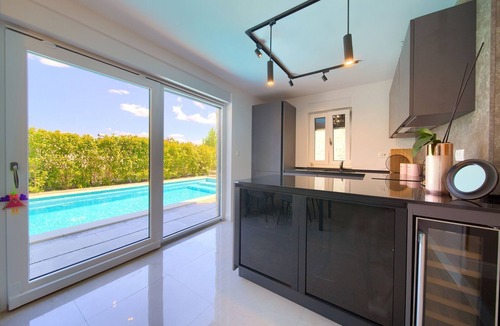 Njivice Apartment | One bedroom apartment with a swimming pool Njivice, Krk (A-22805-a)
