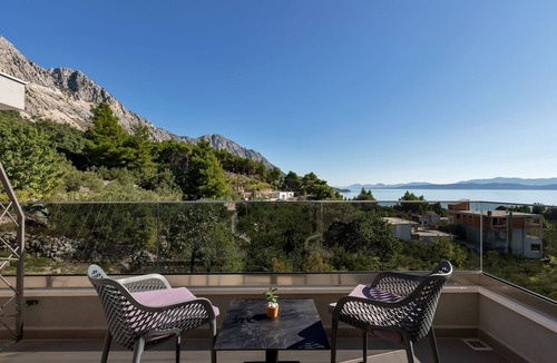 Podgora Apartment | One bedroom apartment with terrace and sea view Podgora, Makarska (A-18920-c)