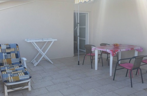 Kolan Apartment | One bedroom apartment with terrace and sea view Kolan, Pag (A-16482-a)