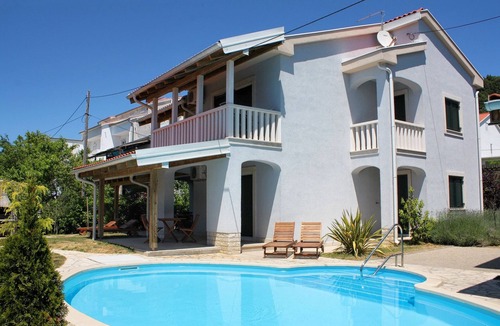 Palit Apartment | One bedroom apartment with a swimming pool Banjol, Rab (A-3215-b)