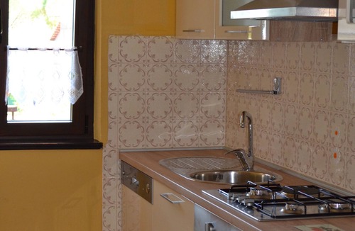 Umag Apartment | Pink apartment with two terraces, garden, a stone's throw from the beach