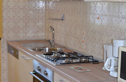 Umag Apartment | Pink apartment with two terraces, garden, a stone's throw from the beach