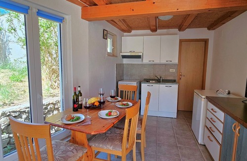Bol Cottage | Quaint old stone cottage with large terrace just 150m from the beach