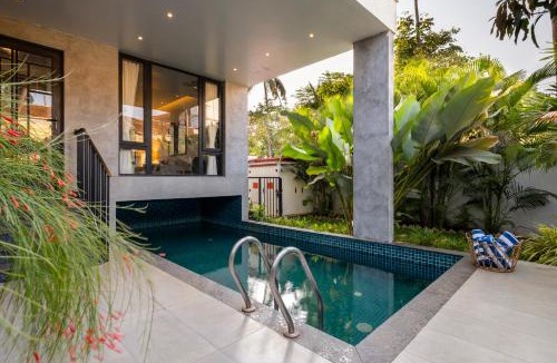 Nerul Villa | SaffronStays Rio - 4BR pet-friendly villa with glass-bottom pool, rooftop party zone & bar near Candolim & Coco Beach