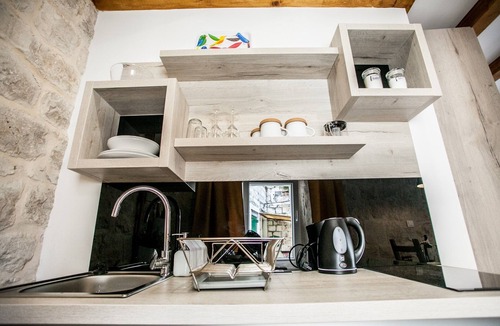 Trogir House | Smooth Marble and Rustic Stone at a Ciovo Island Townhouse