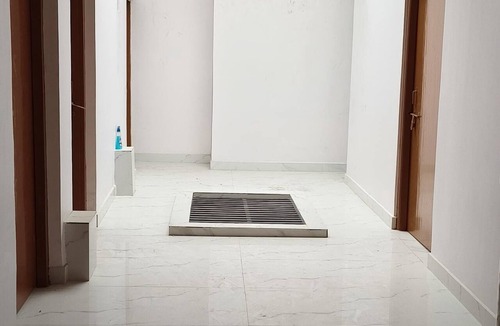 Faizabad House | Spacious 18-Bedroom Retreat in Sacred Ayodhya, Embraced by Comfort and Serenity.
