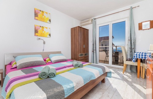 Igrane Apartment | Studio flat with balcony and sea view Igrane, Makarska (AS-22690-a)