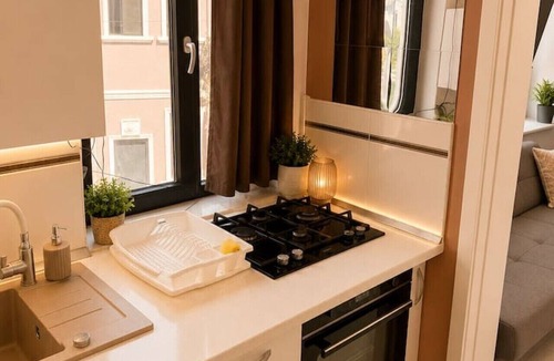 Bucharest Apartment | Stylish 1-Bedroom Apartment with Warm Accents