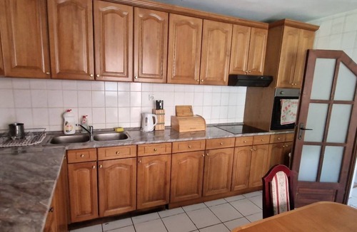 Belgrade House | The beautiful, spacious villa in Vrčin features seven bedrooms and three bathrooms.