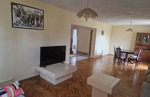 Belgrade House | The beautiful, spacious villa in Vrčin features seven bedrooms and three bathrooms.